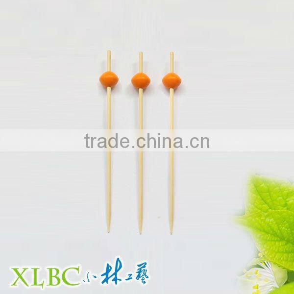 Bamboo picks with rose for party