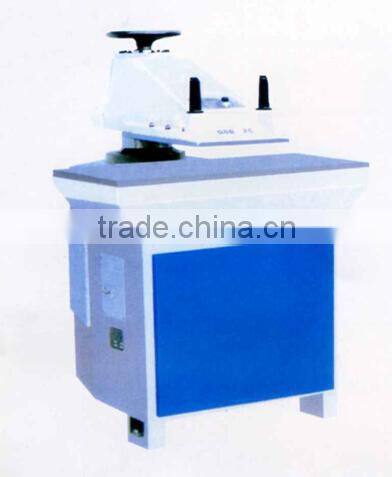 Hydraulic swing arm press cutting machine
