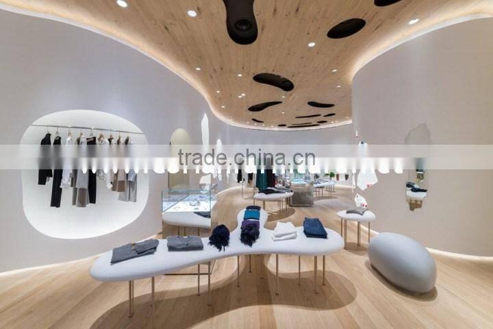 Hi Macs / Corian solid surface made center cashier desk for optical store design