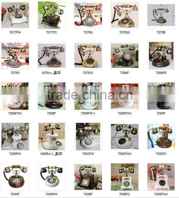 Decorative antique telephone with yellow flower on face