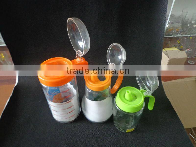 clear glass oil bottle