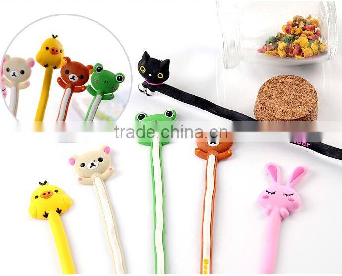 China manufacturer custom yellow duck lovely plastic earphone cable winder/earphone cable holder