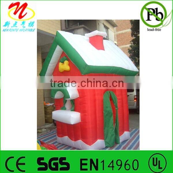 Inflatable Christmas house with animated Santa