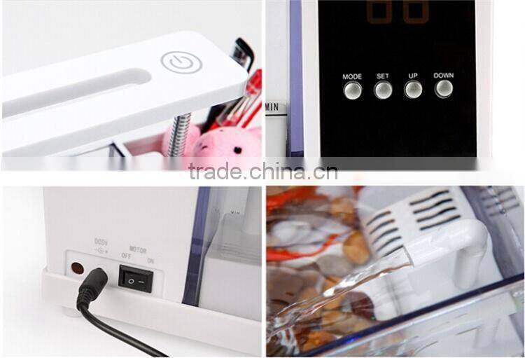 Mini table fish tank, electronic clock on table Lamp