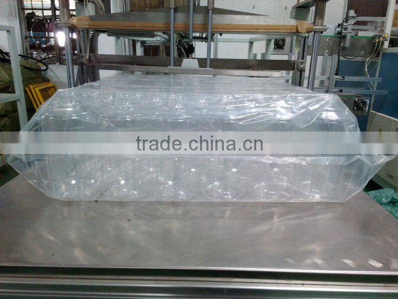 Milk bottle bagging machine