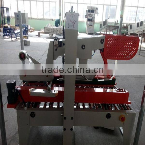 Automatic box sealing machine, automatic carton box sealing machine, carton box packing machine