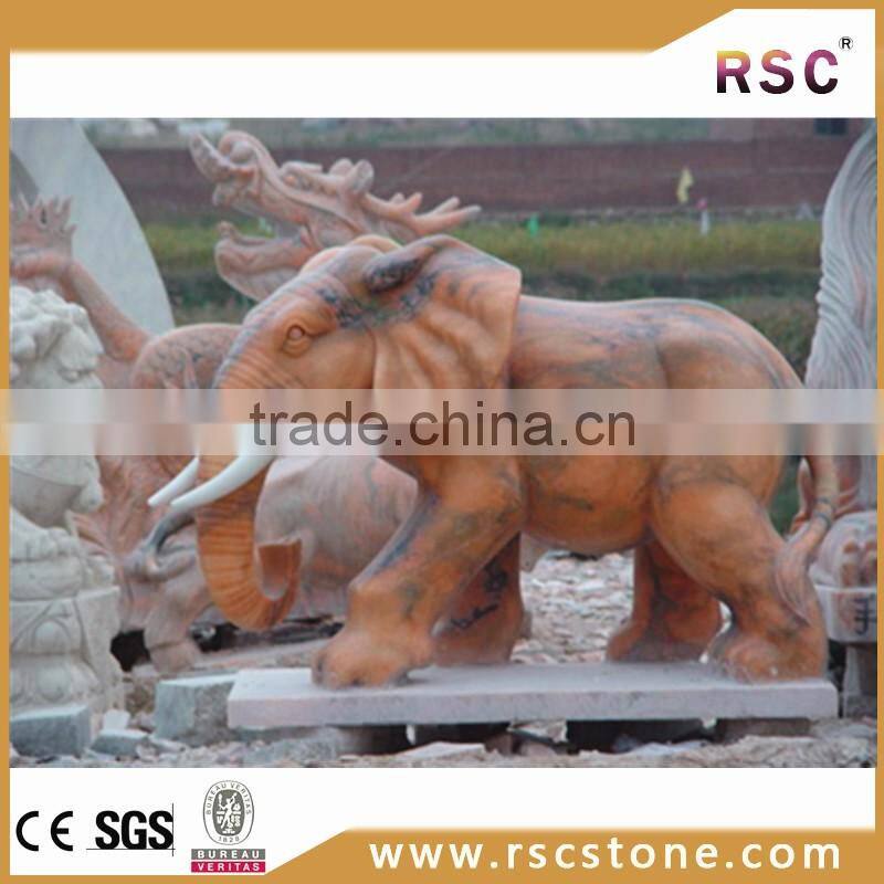 Life-size elephant statue with afterglow red marble