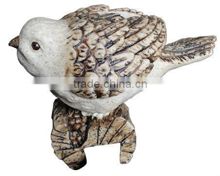 Bird standing on a base pot hanger outdoor birds sculpture