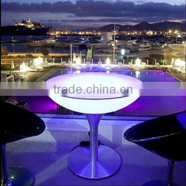 Battery rechargeable LED plastic rotating round production table with legs metal