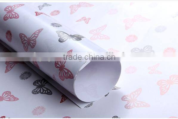 Ivory plastic gift wrapping paper roll