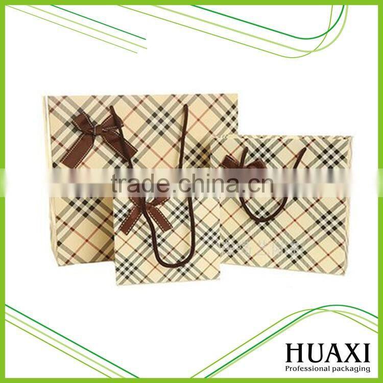 2016 hot sale with logo promotional popular paper shopping bags for garment