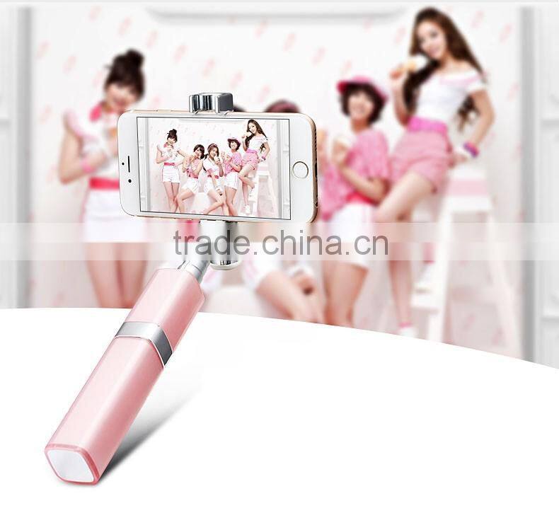 2016 New Wholesale mini automated selfie stick lip gloss selfie stick with cable for iphone and Android Smart phone