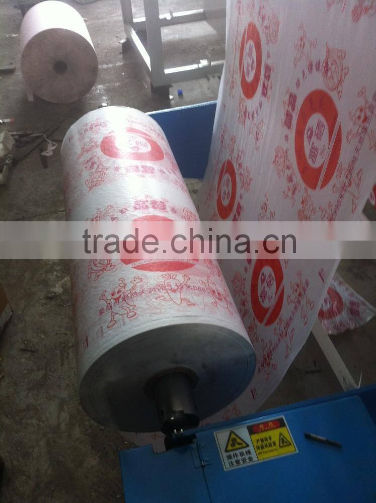 Economic type cake or bread oil on paper roll cutting machine