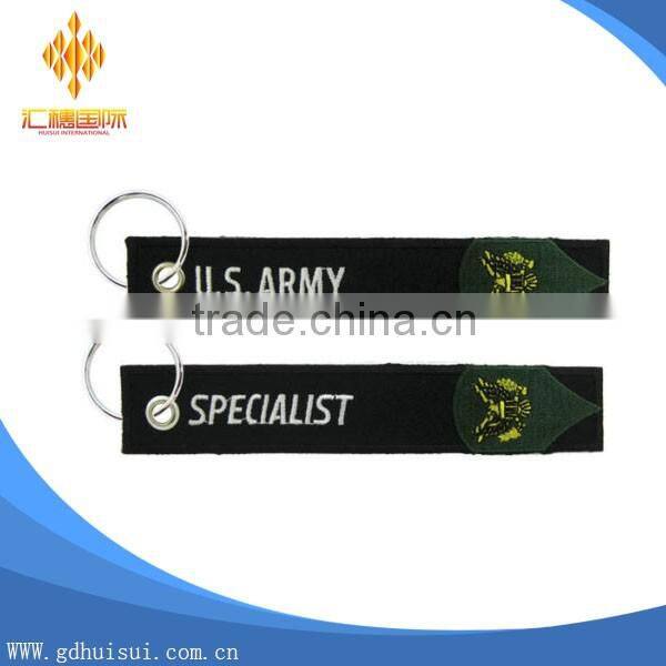 Popular design cheap customized elliptical shape embroidery personalized logo key chain