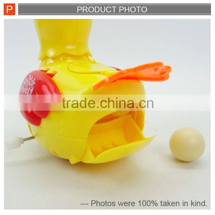 Funny wind up toy hen laying egg for kids