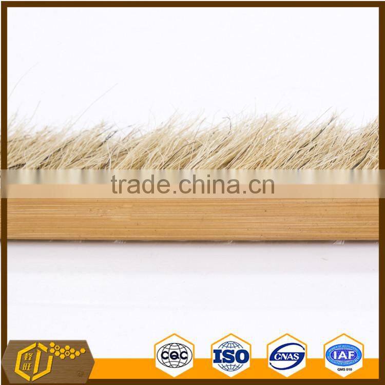 wooden hand beekeeping beehive frame cleaning