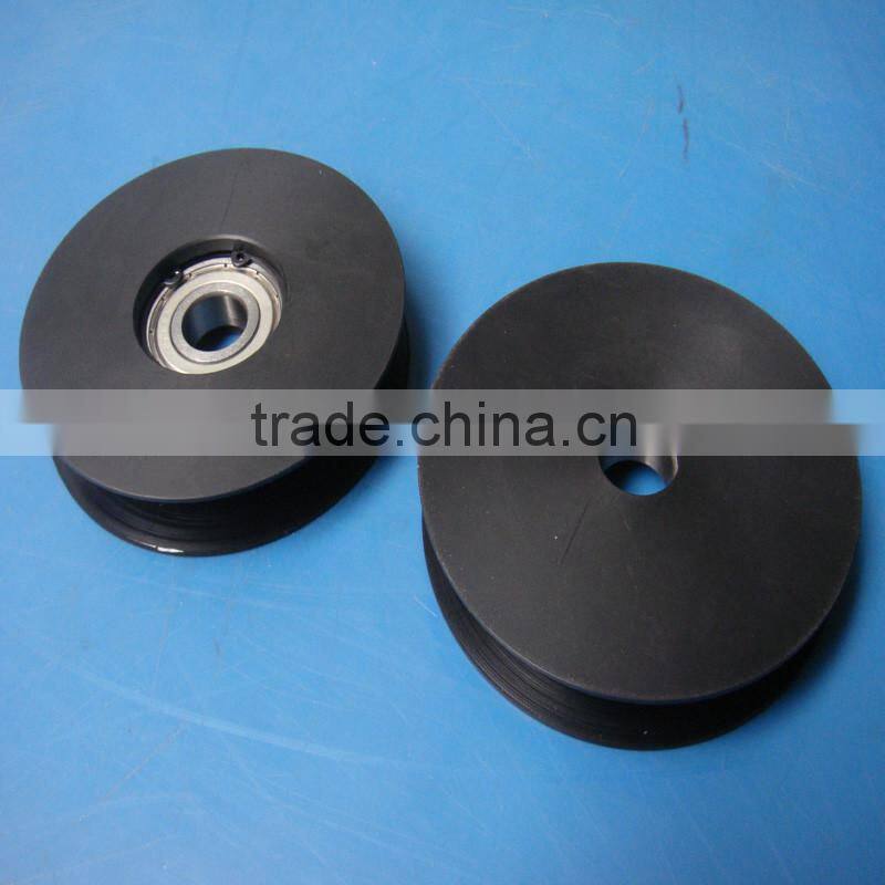 CNC machining black Nylon polyamide PA6 pulley wheels with bearings