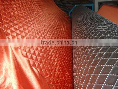 Automatic quilting embossing machine