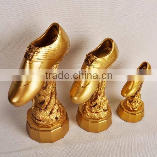 Large middle small golden soccer shoe world cup
