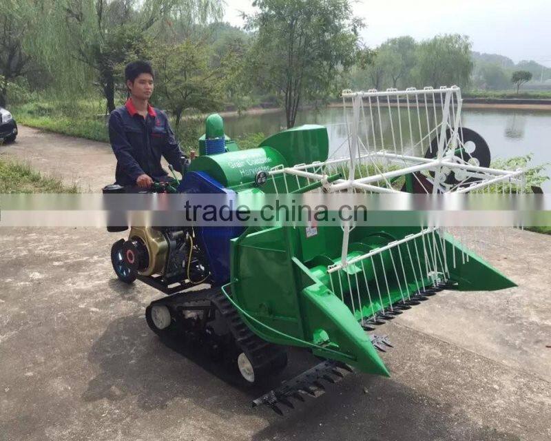 Crawler type mini grain harvester with driver seat