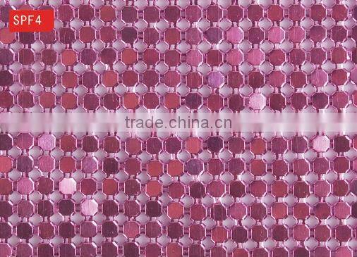 Shimmering mesh metal fabric for screen