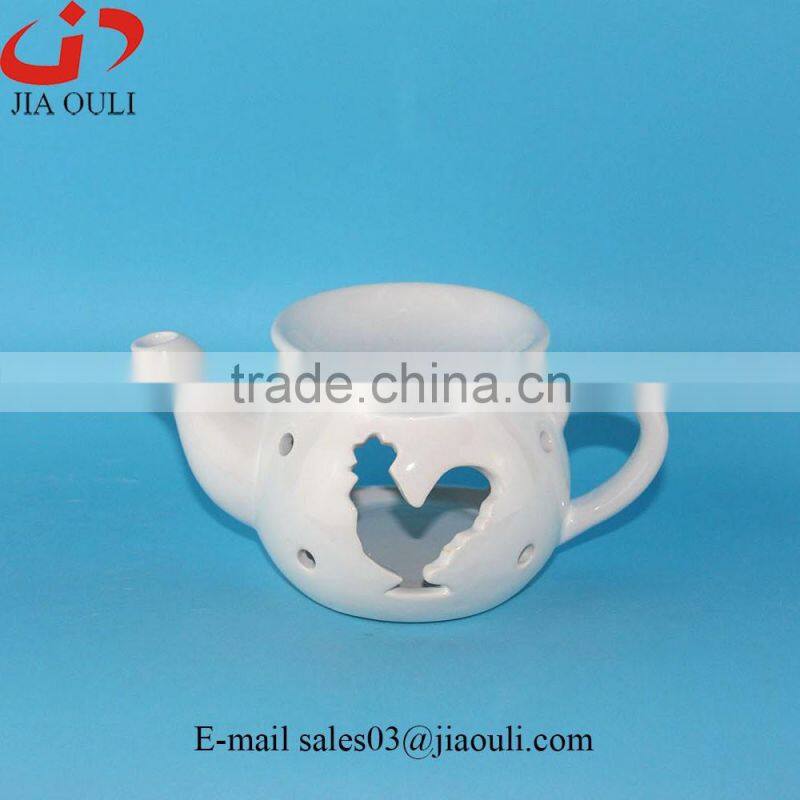 Hot design cheap teapot shape ceramic oil warmers, oil heater stove