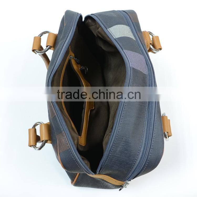 Dongguan manufacturers grid pattern fashion portable luggage bag with tassel pendant,travel bag OEM factory
