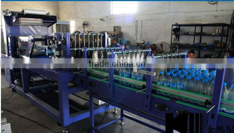 Automatic hot shrink film wrapping packing machine