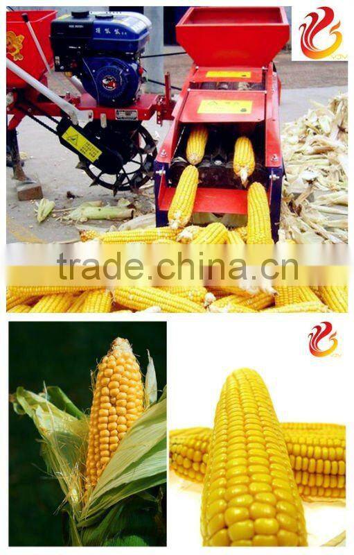 Agricultural corn husker machine