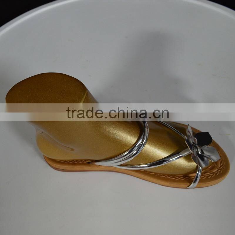 Fashion flip-flops display Golden mannequin feet and foot for shoes display