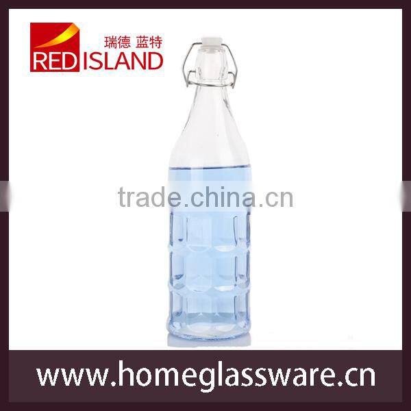 colored glass bottle with clamp lid