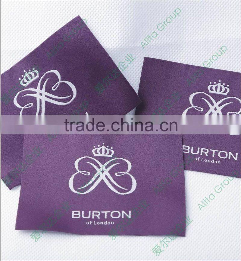 Wholesale direct factory custom garment plastic label of high quality