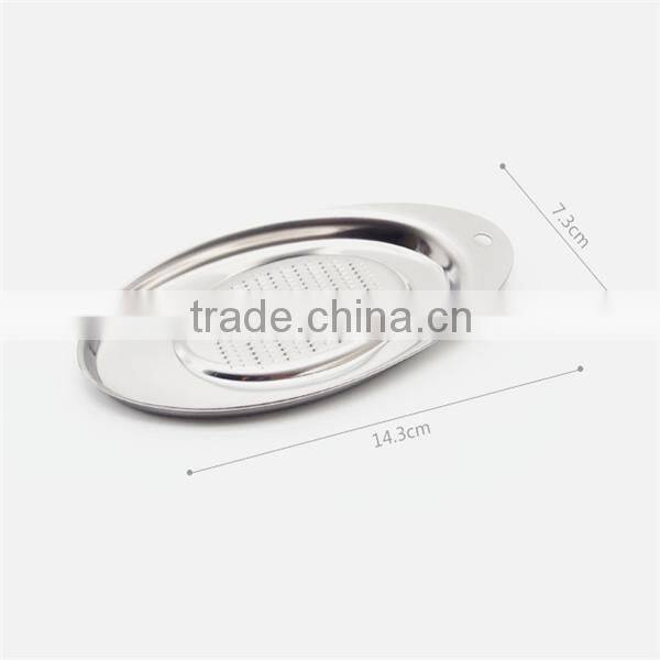 Spoon shaped ginger chocolate nutmeg garlic grater