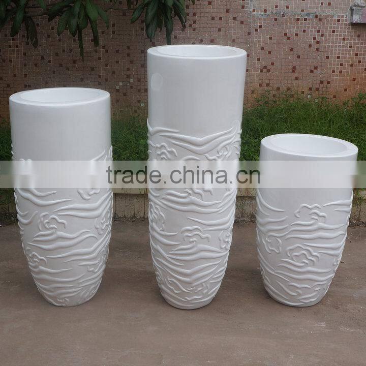Modern white fiberglass planter