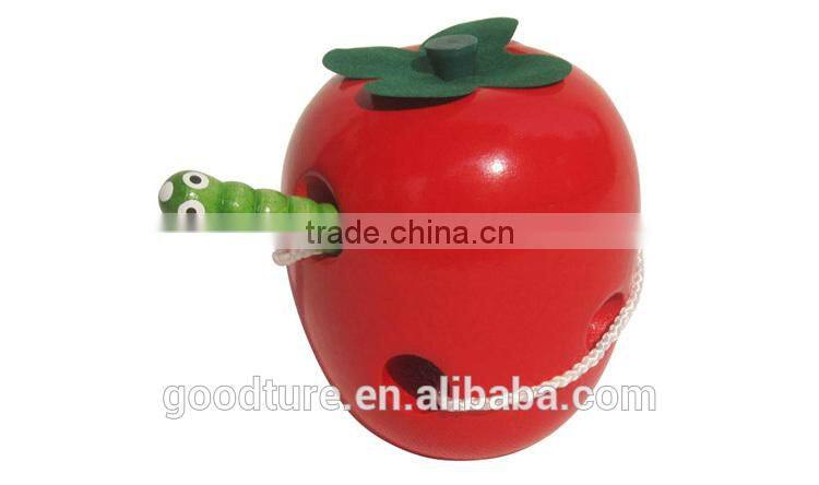 Wooden Caterpillar Eating Red Apple