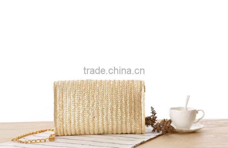 straw clutch bag with cherry pattern, gold chain cross body