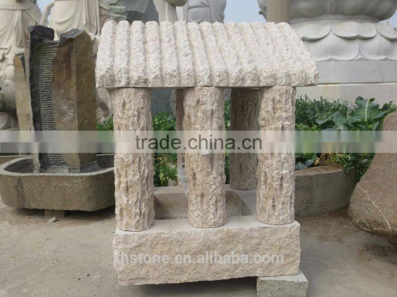 Hand carved garden stone water fountain in Chinese well style .