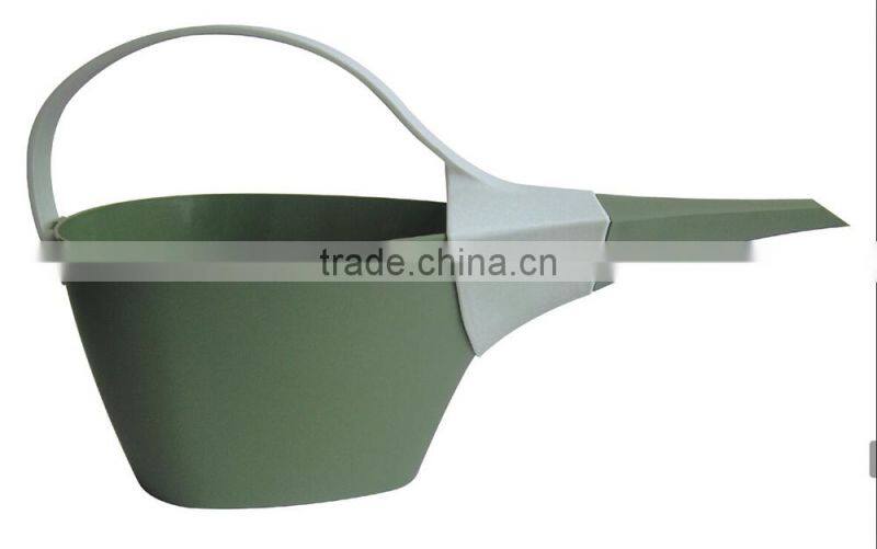 family garden watering can rose