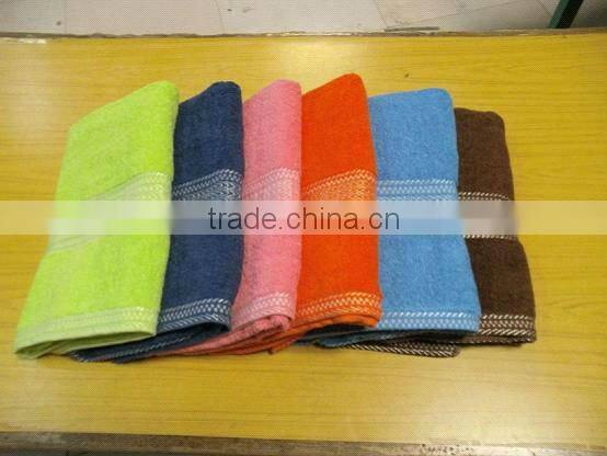 111204 Stock 14s low twist solid dyed jacquard cotton bath towel stock for hotel