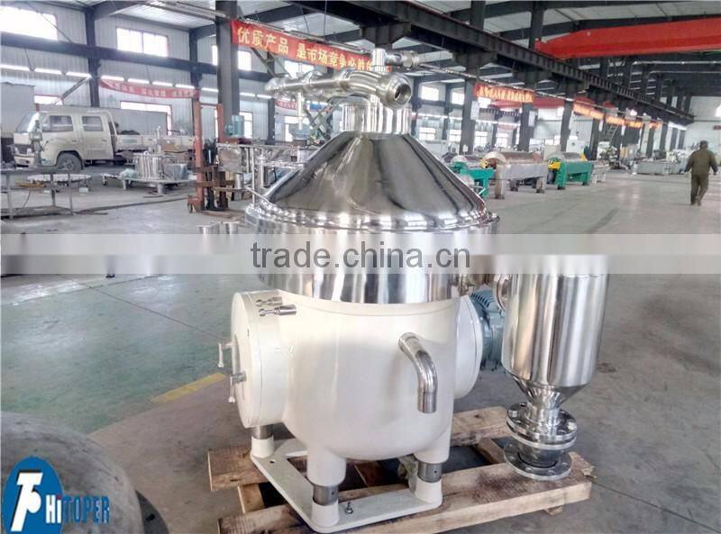 Continuous working liquid disc centrifuge milk separator