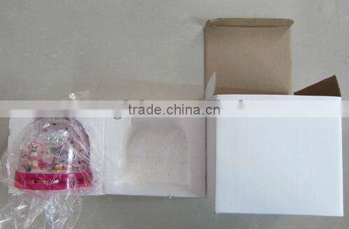 Plastic ghost snow globe