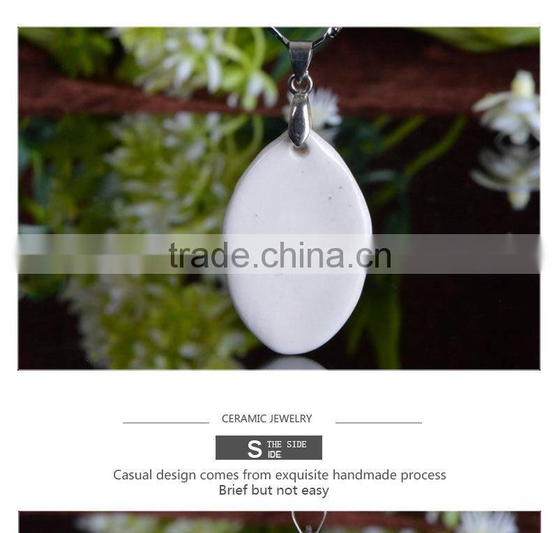 Handmade fancy head shape christmas white ceramic necklace