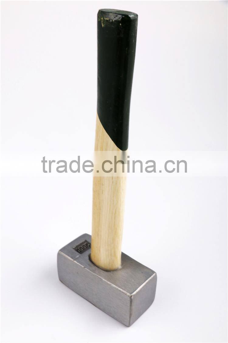 Professional mason's hammer with wooden handle , stone hammer