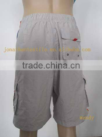 board shorts! men's board shorts in the beach! beachwear! casualwear!