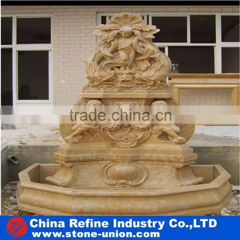 wall fountain carved with human figures