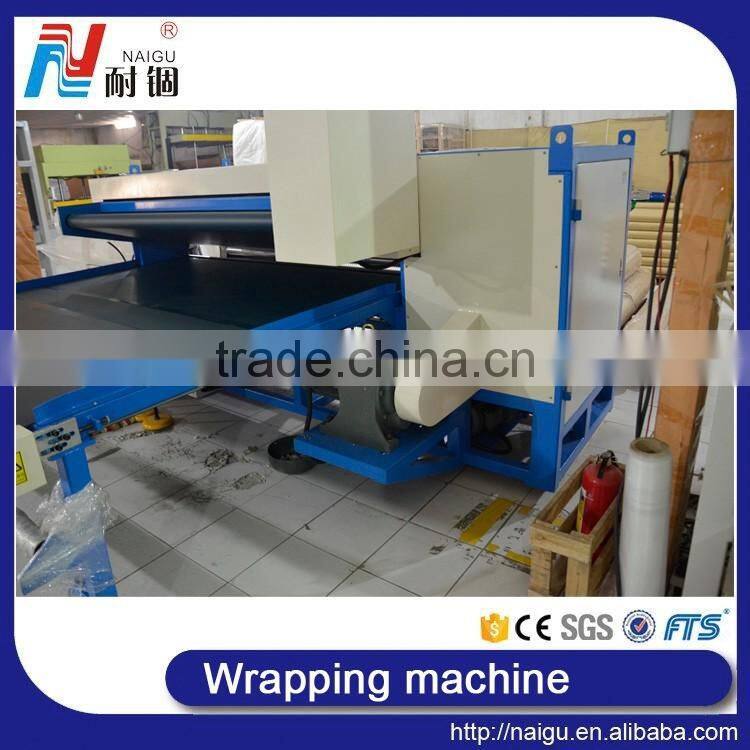 China Foshan factory price latex foam mattress compression machine/mattress roll packing machine