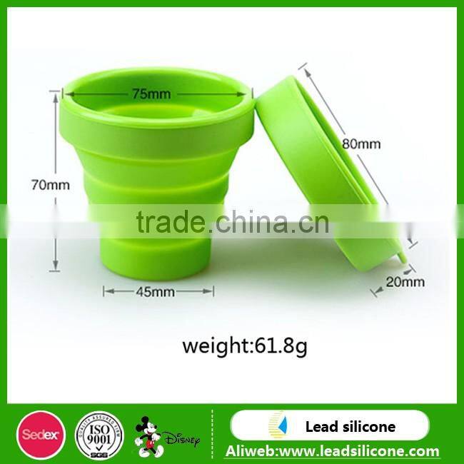 Heat resistant collapsible double wall glass cup with silicone lid