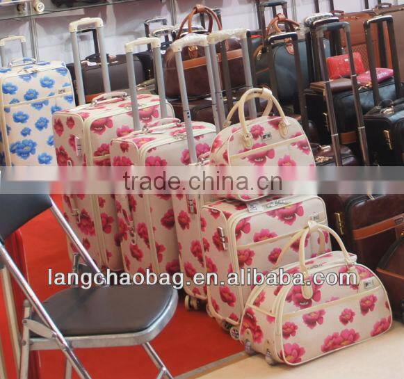 red brown crocodile trolley duffle bag