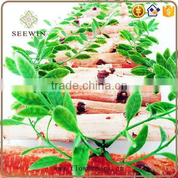 The birch stick is decorated in the garden