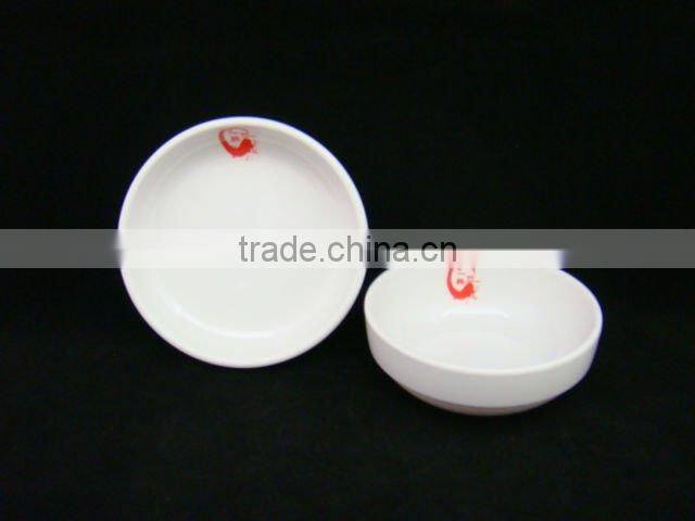 white round melamine sauce dish
